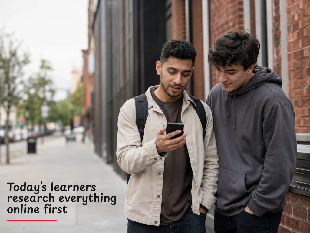 two young adults researching driving instructors on their phone